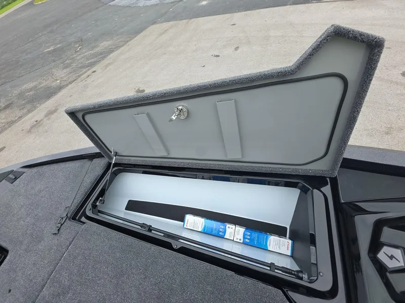 Slide: The Image of Open storage compartment in a 2025 iKon vls20 vehicle, showcasing interior design. - 16