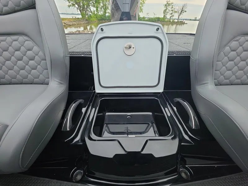 Slide: The Image of Interior of 2025 iKon vls20 boat with open storage compartment between seats. - 18