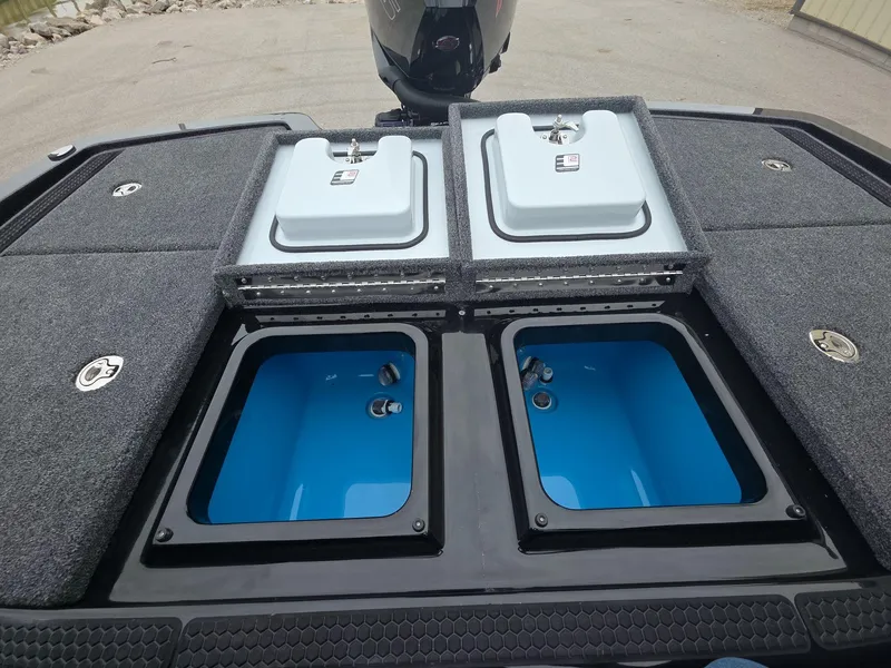 Slide: The Image of iKon vls20 2025 boat with open storage compartments and blue interior. - 19