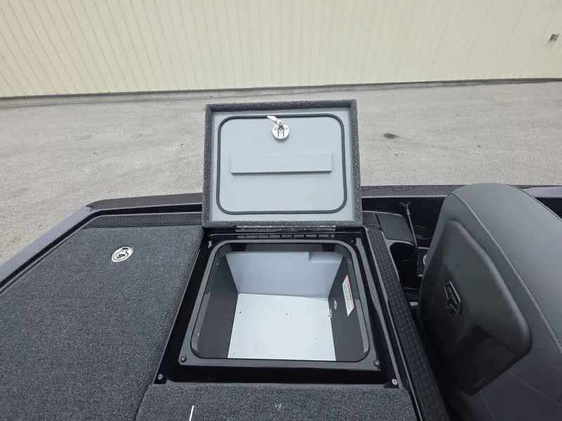 Slide: The Image of Open storage compartment on iKon vls20 boat, 2025 model, with gray interior. - 20