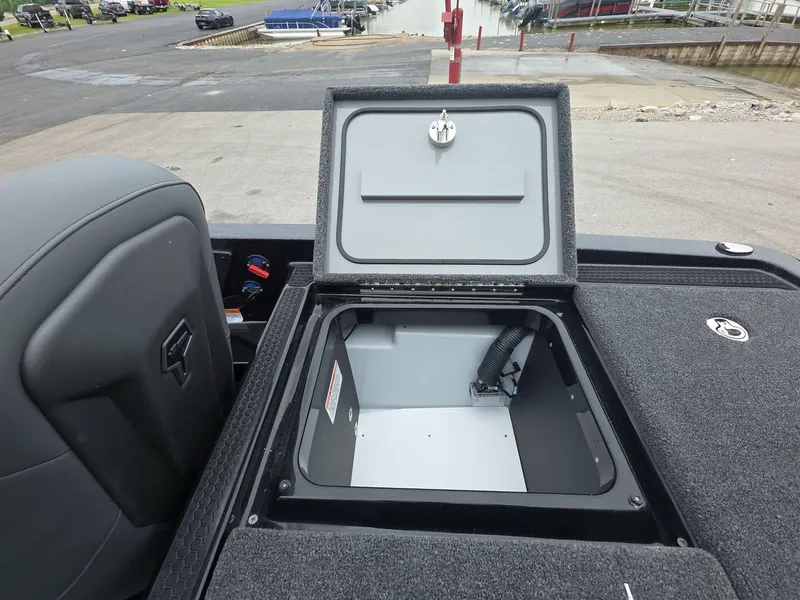 Slide: The Image of Open storage compartment on 2025 iKon vls20 boat, showcasing interior space and design. - 21