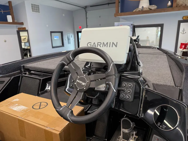 Slide: The Image of Steering wheel and Garmin display in 2025 iKon vls20 boat cockpit. - 8