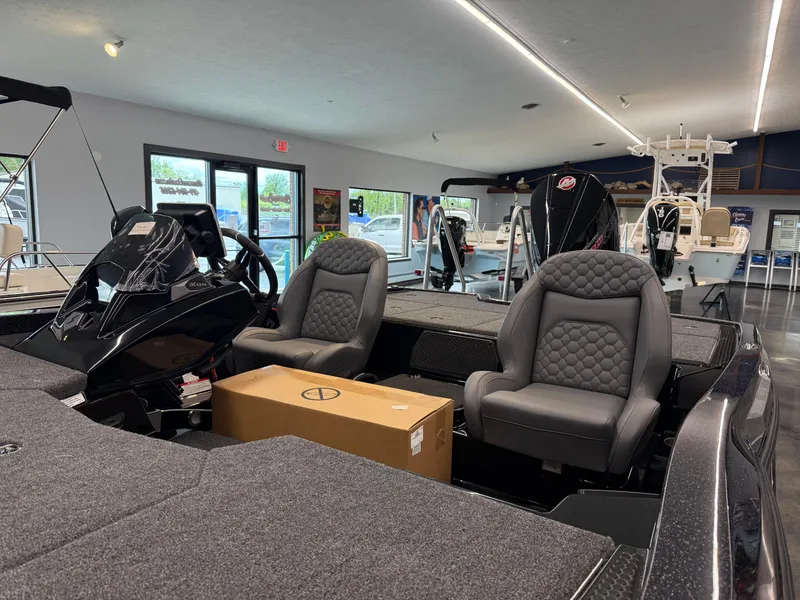 Slide: The Image of Modern iKon vls20 boat interior with plush seating, showroom display, 2025 model. - 9