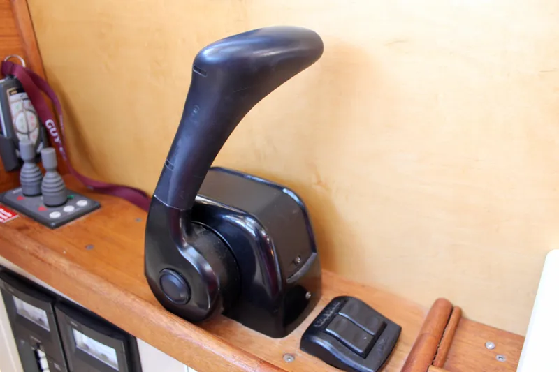 Slide: The Image of Throttle control lever on 2011 Ranger Tugs R-27 boat dashboard. - 36