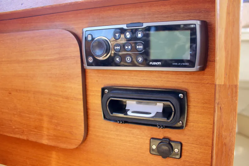 Slide: The Image of Fusion MS-AV600 marine stereo on 2011 Ranger Tugs R-27 wooden dashboard. - 40