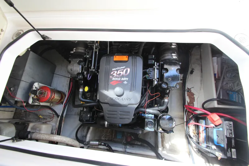 Slide: The Image of Engine compartment of a 2004 Regal 2665 Commodore with a Mercury 350 MAG MPI engine. - 22