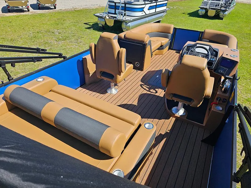 Slide: The Image of 2025 Bentley Pontoons 223 Elite Swingback Dual Captain Full Tritoon with luxurious seating and modern design. - 11