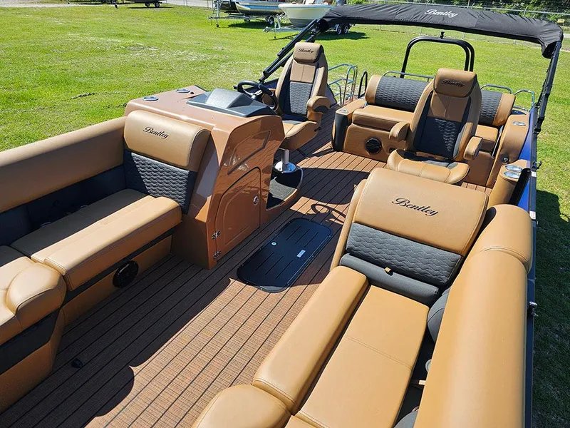 Slide: The Image of 2025 Bentley Pontoons 223 Elite Swingback Tritoon with luxurious seating and modern design. - 12
