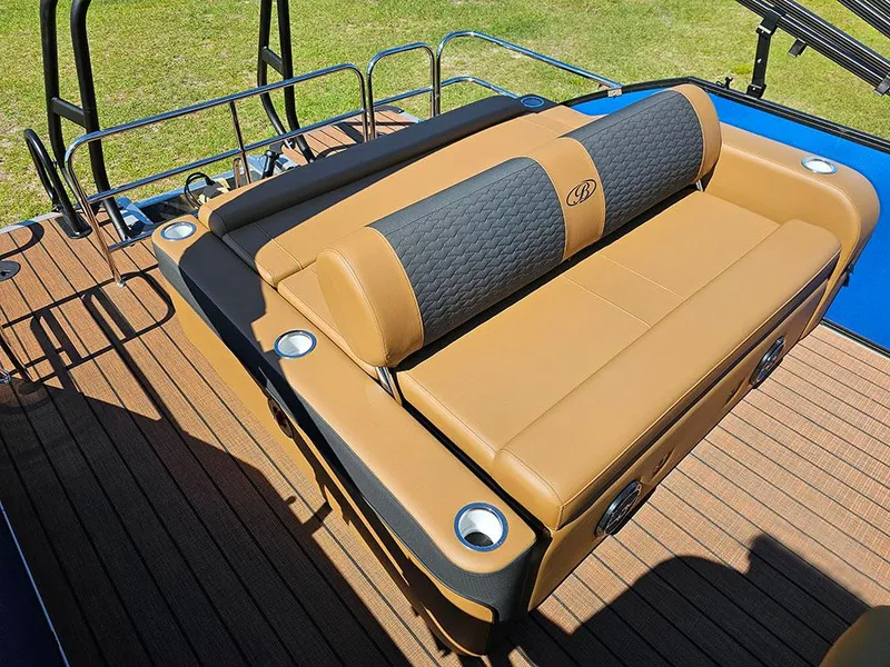 Slide: The Image of 2025 Bentley Pontoons 223 Elite Swingback Tritoon with luxurious tan seating on deck. - 13