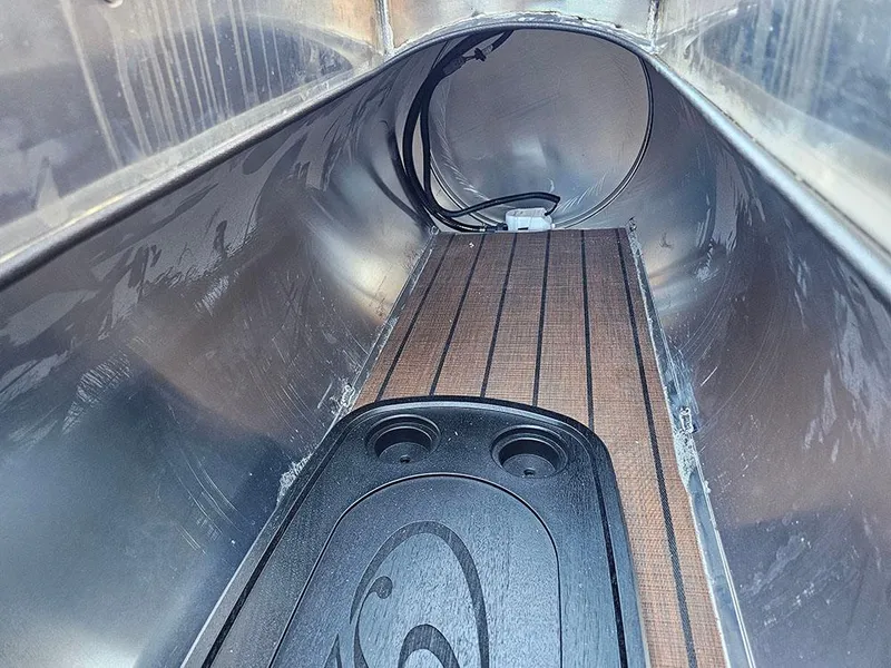 Slide: The Image of Interior view of 2025 Bentley Pontoons 223 Elite Swingback Tritoon, showcasing sleek design and wiring. - 29