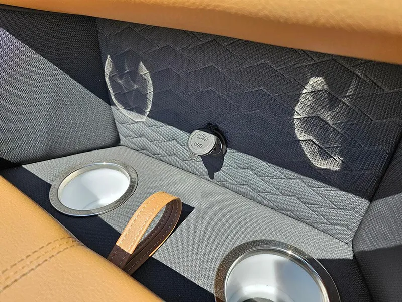 Slide: The Image of 2025 Bentley Pontoons 223 Elite interior with USB port and cup holders. - 33