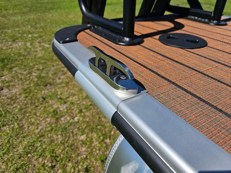 Slide: The Image of 2025 Bentley Pontoons 223 Elite Swingback Tritoon deck detail with cleat. - 38