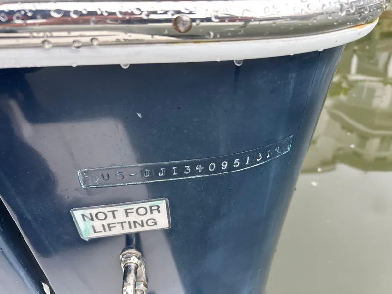 Slide: The Image of 2014 Regulator 34 boat hull with serial number and "Not for Lifting" label. - 21