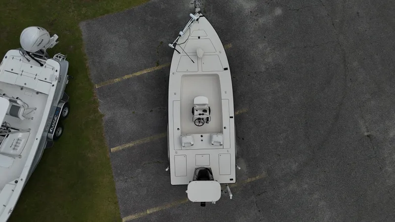 Slide: The Image of Aerial view of a 1999 Maverick 21 Master Angler boat parked on asphalt. - 4