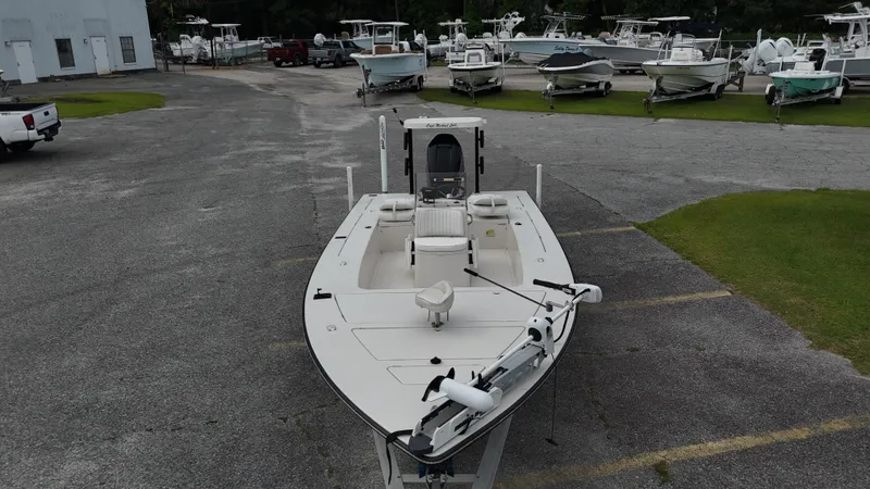 Slide: The Image of 1999 Maverick 21 Master Angler boat parked in a marina with other boats. - 5