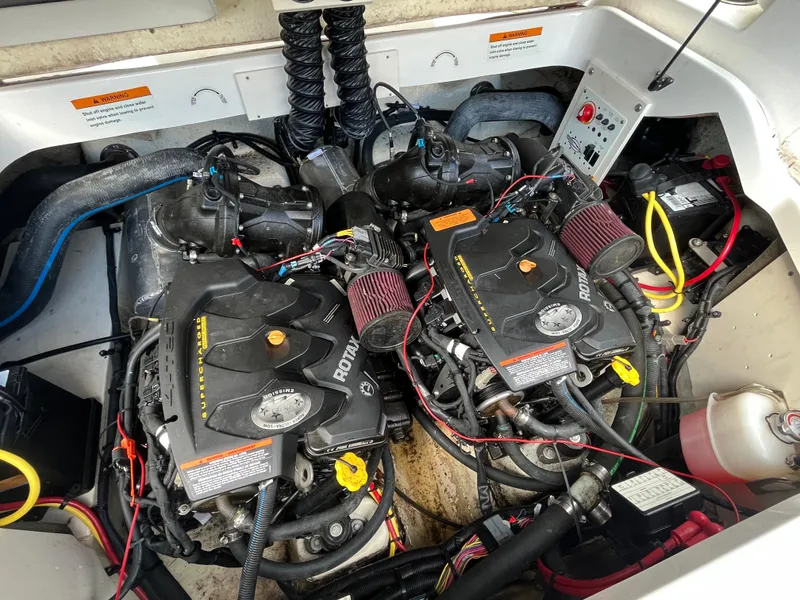 Slide: The Image of 2018 Chaparral Vortex 243 engine compartment with dual Rotax engines. - 15
