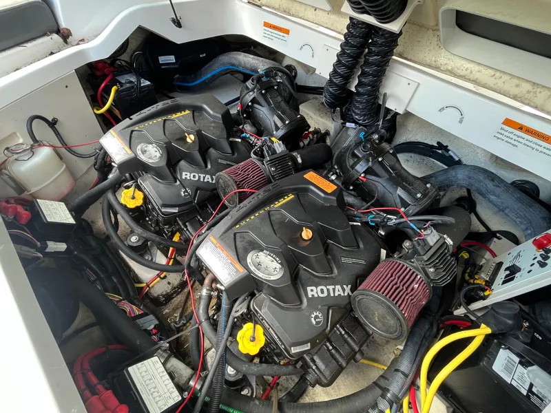 Slide: The Image of 2018 Chaparral Vortex 243 engine compartment with dual Rotax engines. - 16