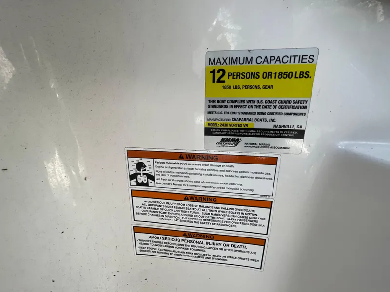 Slide: The Image of 2018 Chaparral Vortex 243 capacity warning labels, maximum 12 persons or 1850 lbs. - 17