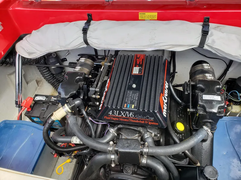 Slide: The Image of Engine compartment of a 1993 Baja 204 Islander boat with MerCruiser 4.3L V6 engine. - 6