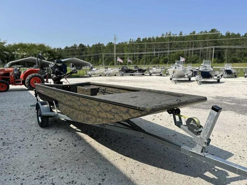 Slide: The Image of 2025 Gator Tail 1754 Extreme Series boat on trailer, outdoor display. - 3