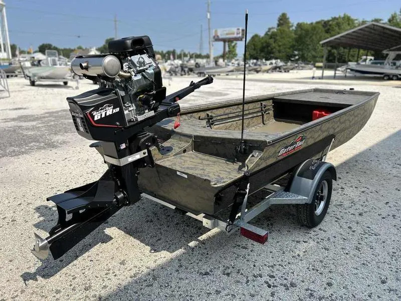 Slide: The Image of 2025 Gator Tail 1754 Extreme Series boat on trailer, outdoor display. - 5