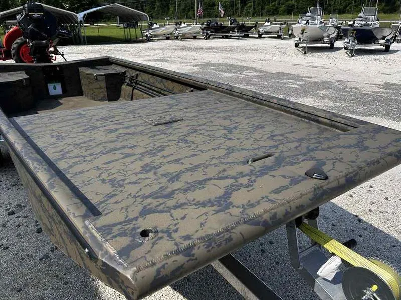 Slide: The Image of 2025 Gator Tail 1754 Extreme Series boat with camouflage design on a trailer. - 9