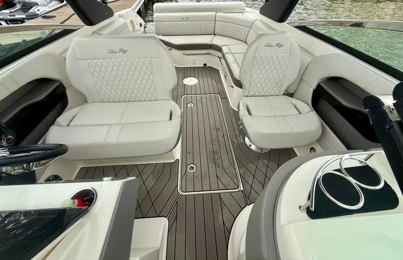 Slide: The Image of 2022 Sea Ray SLX 280 boat interior with luxurious seating and elegant design. - 20