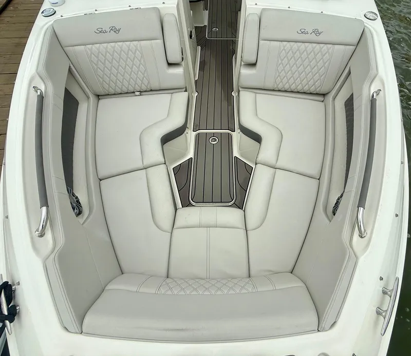 Slide: The Image of 2022 Sea Ray SLX 280 boat interior with luxurious seating and elegant design. - 26