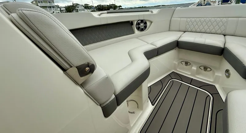 Slide: The Image of Luxurious interior of 2022 Sea Ray SLX 280 boat with plush seating. - 27