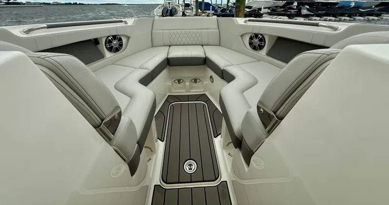 Slide: The Image of Luxurious interior of 2022 Sea Ray SLX 280 boat with spacious seating and modern design. - 30