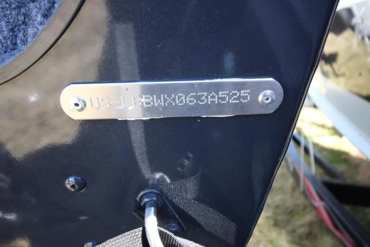 Slide: The Image of 2025 Lund 1775 Crossover XS boat identification plate with engraved serial number. - 11
