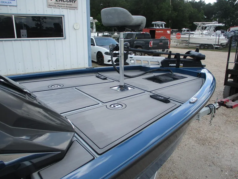 Slide: The Image of 2024 Avid 18XB boat with a spacious deck and fishing seat. - 3