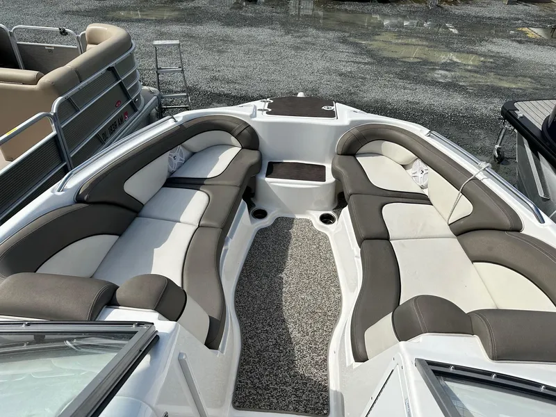 Slide: The Image of 2011 Yamaha 242 Limited Jet Boat interior with spacious seating and modern design. - 5
