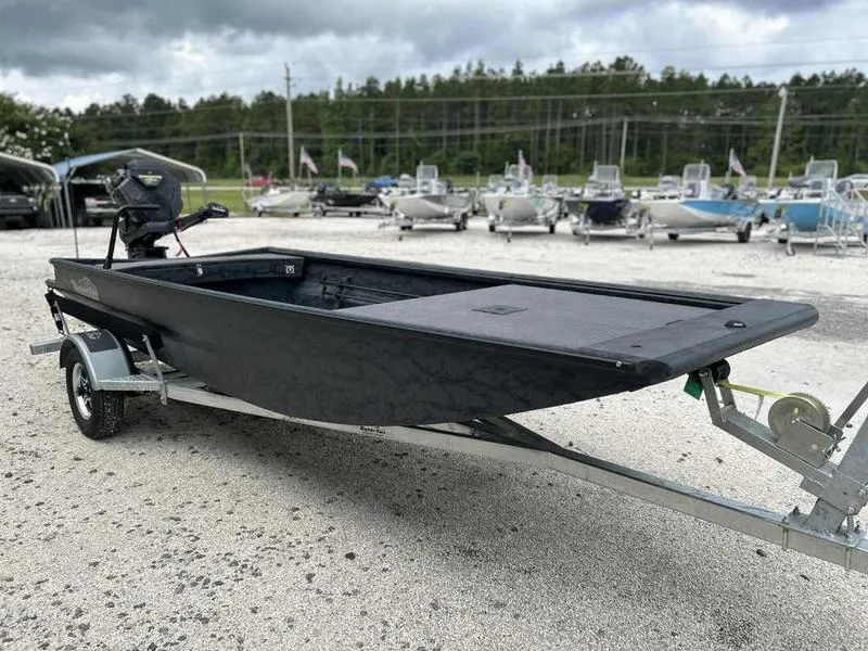 Slide: The Image of 2025 Gator Tail 1754 Extreme Series boat on trailer, parked outdoors. - 3