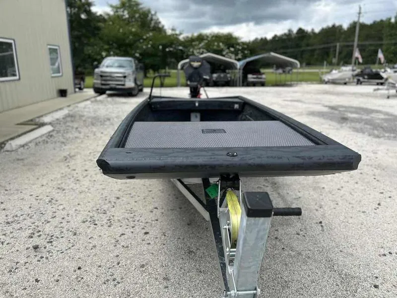 Slide: The Image of 2025 Gator Tail 1754 Extreme Series boat on trailer, parked outdoors. - 4