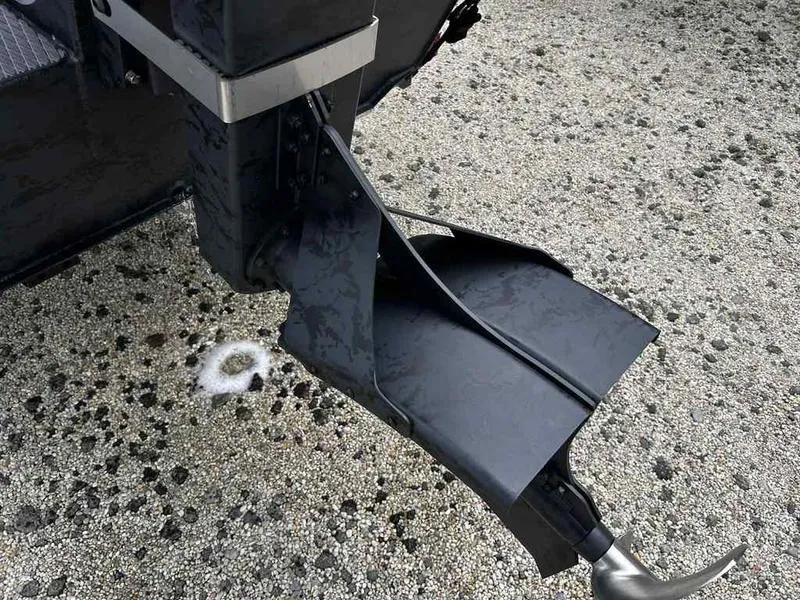 Slide: The Image of 2025 Gator Tail 1754 Extreme Series boat motor on gravel surface. - 6