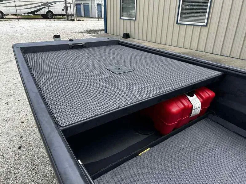 Slide: The Image of 2025 Gator Tail 1754 Extreme Series boat with storage compartment and red fuel tank. - 9