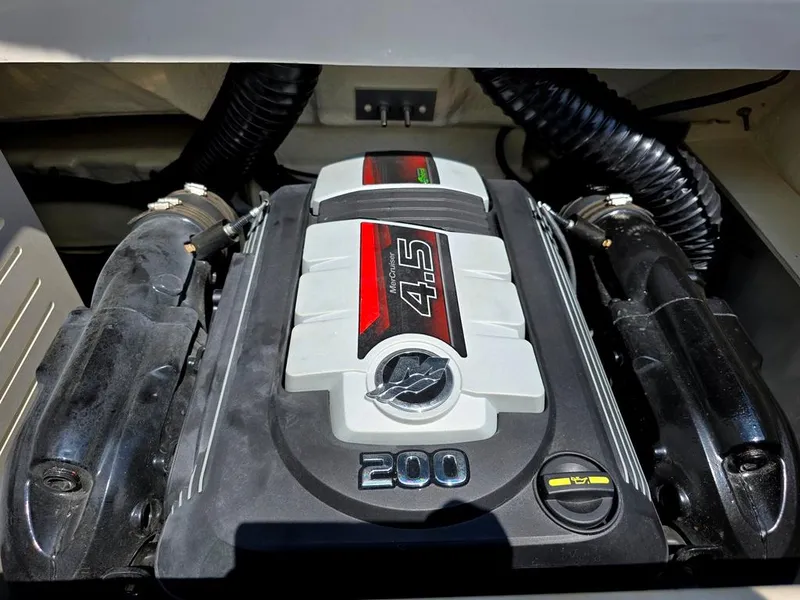 Slide: The Image of Engine of 2020 Sea Ray SPX 210 boat, featuring a 4.5L 200 horsepower motor. - 12