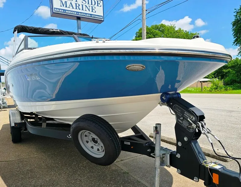 Slide: The Image of 2020 Sea Ray SPX 210 boat on trailer at Bayside Marine dealership. - 13