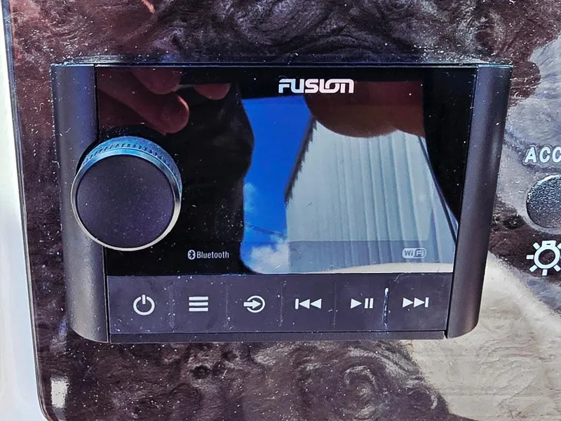 Slide: The Image of Fusion audio system on 2020 Sea Ray SPX 210 boat dashboard with Bluetooth connectivity. - 17