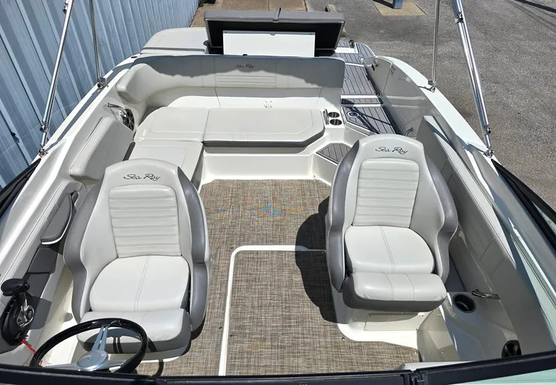 Slide: The Image of 2020 Sea Ray SPX 210 boat interior with two seats and spacious layout. - 6