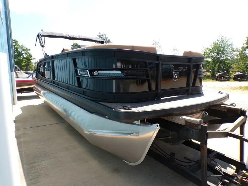 Slide: The Image of 2025 Godfrey AquaPatio 235 SBC iMPACT pontoon boat on trailer, side view. - 15