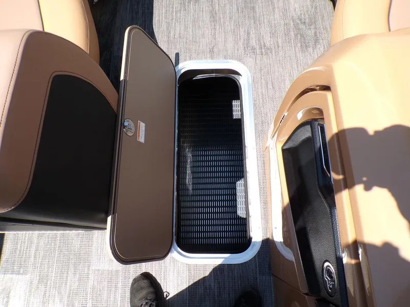 Slide: The Image of Open storage compartment on 2025 Godfrey AquaPatio 235 SBC iMPACT pontoon boat. - 6