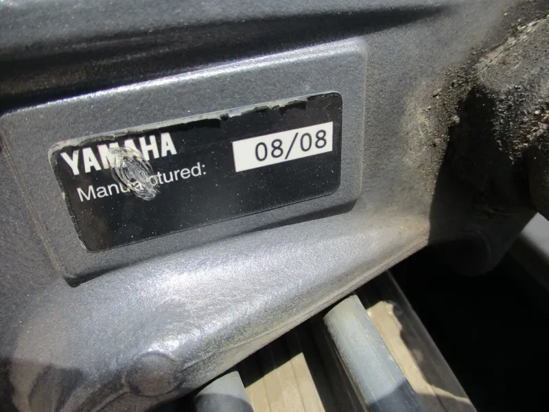 Slide: The Image of Close-up of Yamaha manufacturing label, dated 08/08, on a G3 1966 SC model. - 13