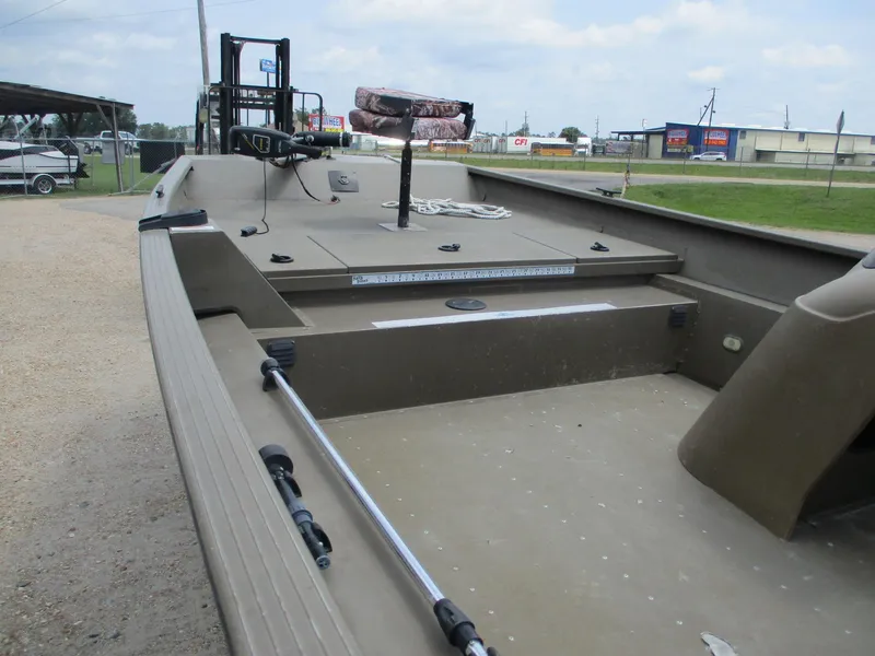 Slide: The Image of Aluminum fishing boat G3 1966 SC, 2010 model, parked outdoors on gravel. - 7