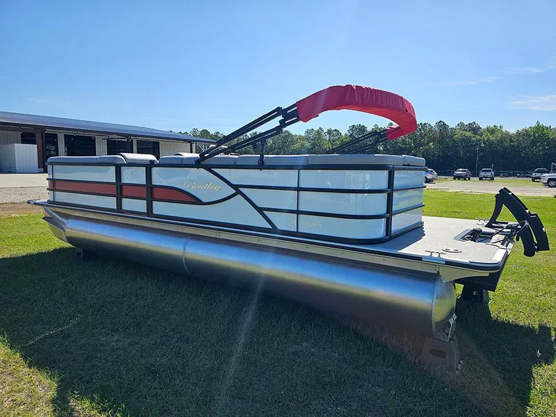 Slide: The Image of 2025 Bentley Pontoons Legacy 243 Cruise Tritoon, featuring sleek design and spacious seating. - 7