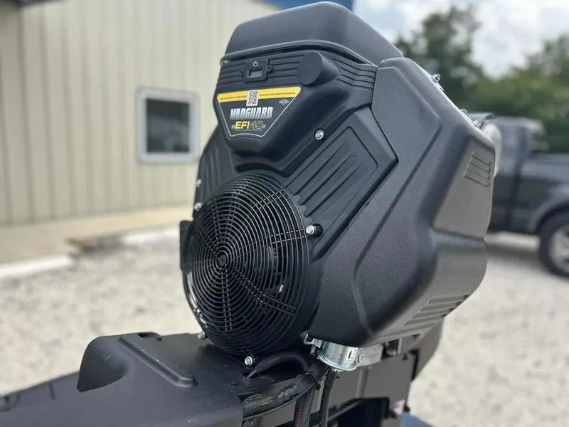 Slide: The Image of 2025 Gator Tail EXTREME MOD-V 1854 engine close-up with Vanguard EFI system. - 3