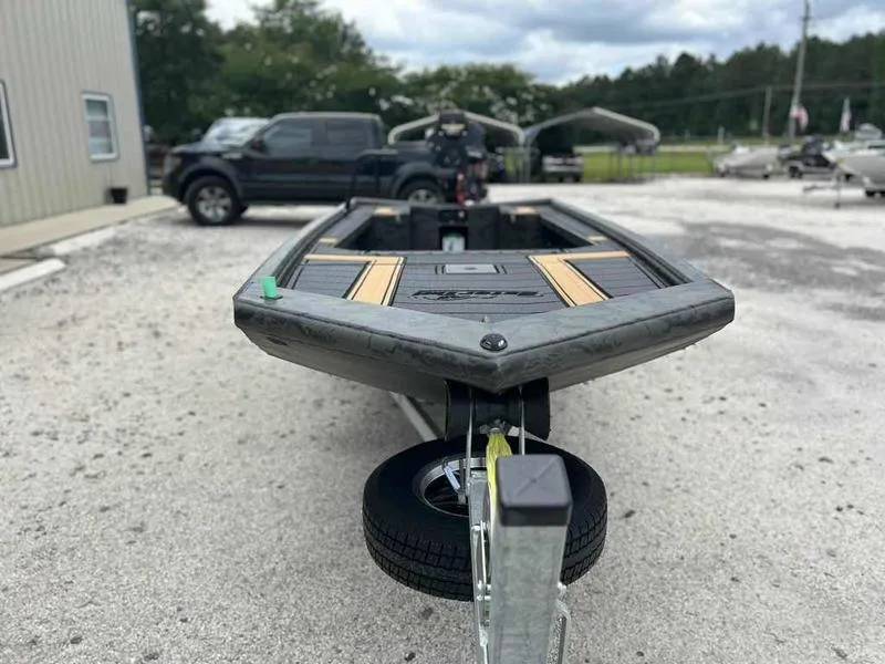 Slide: The Image of 2025 Gator Tail EXTREME MOD-V 1854 boat on trailer, parked outdoors. - 6