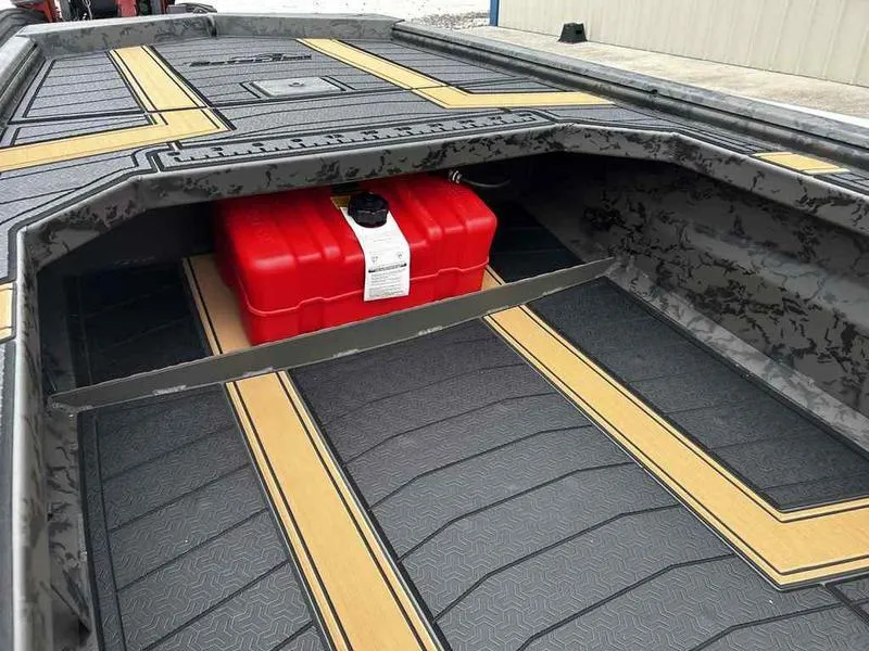 Slide: The Image of 2025 Gator Tail EXTREME MOD-V 1854 boat interior with red fuel tank and patterned flooring. - 8