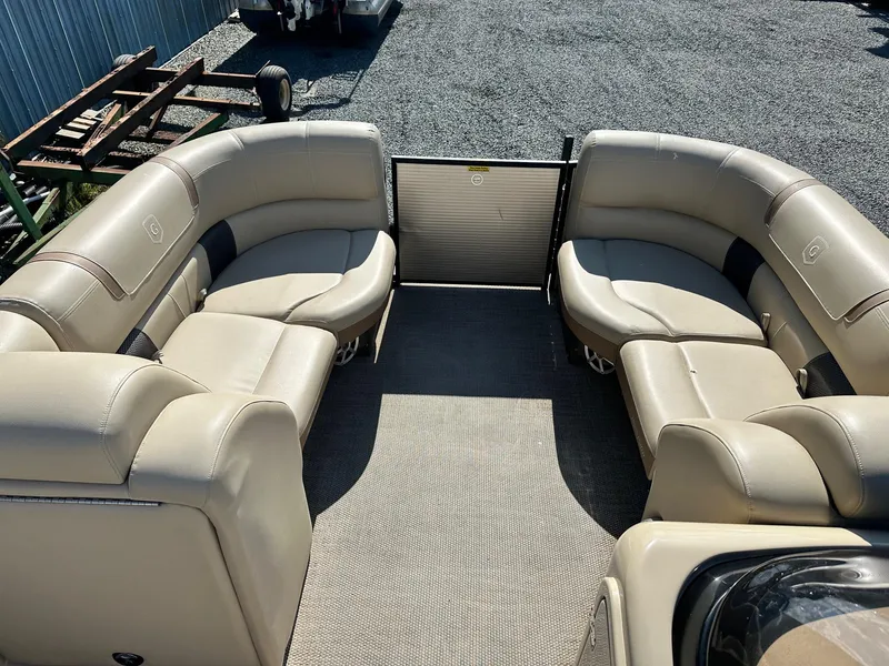 Slide: The Image of 2017 Godfrey AQUA PATIO 235UL pontoon boat with beige seating and spacious layout. - 5